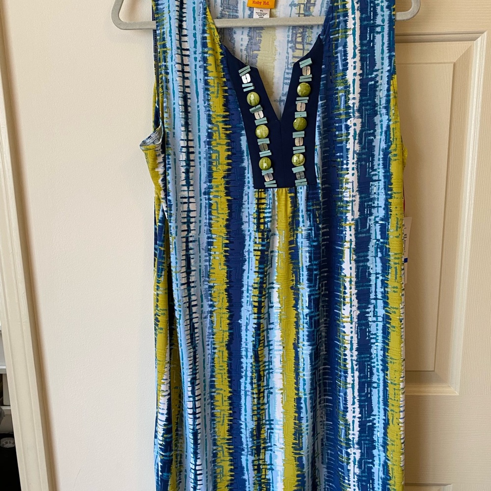 New Sleeveless Dress w button accents at top.  96% Polyester & 4% Spandex